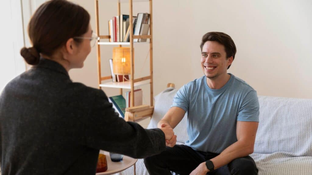 A man greeting his therapist during counseling in Houston.