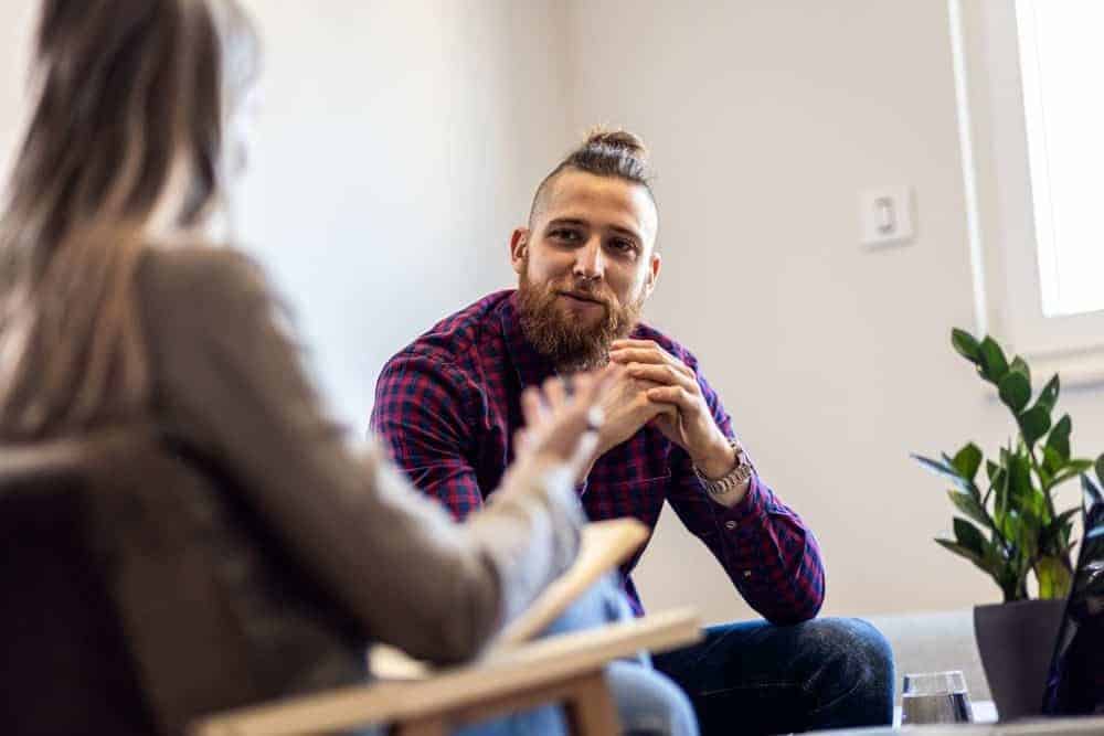 A Man Sitting in Therapy